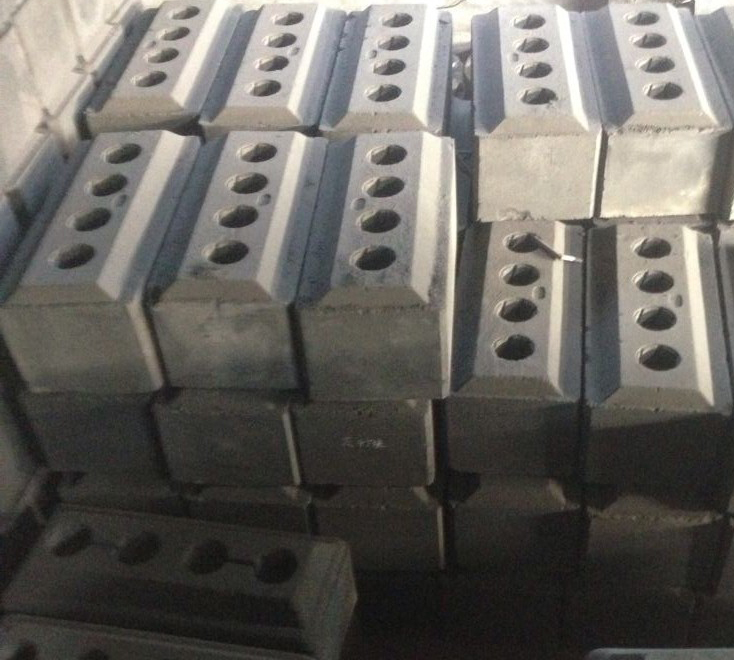 Proces výroby předpečeného anodového uhlíkového bloku